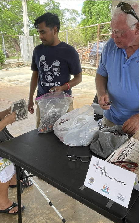 Volunteers sorting glasses